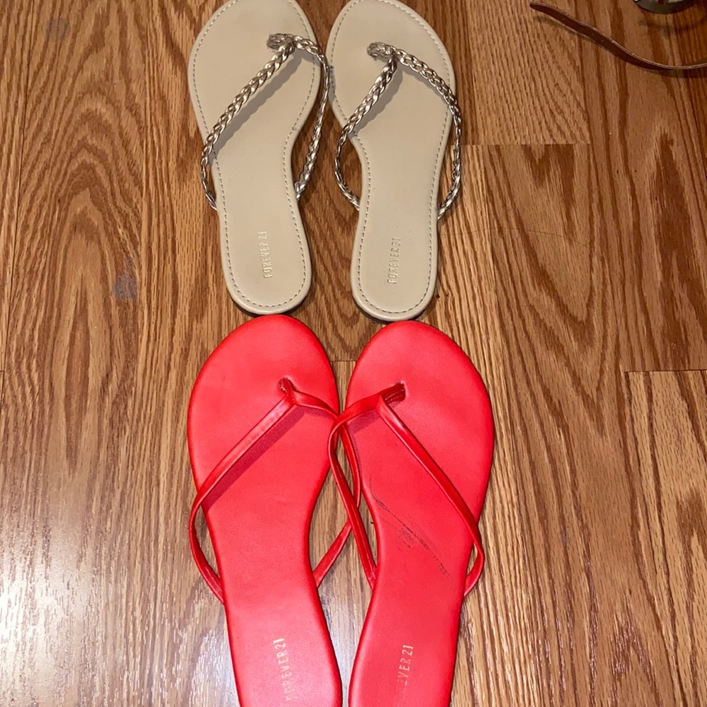 Two pairs of flip flops size 7